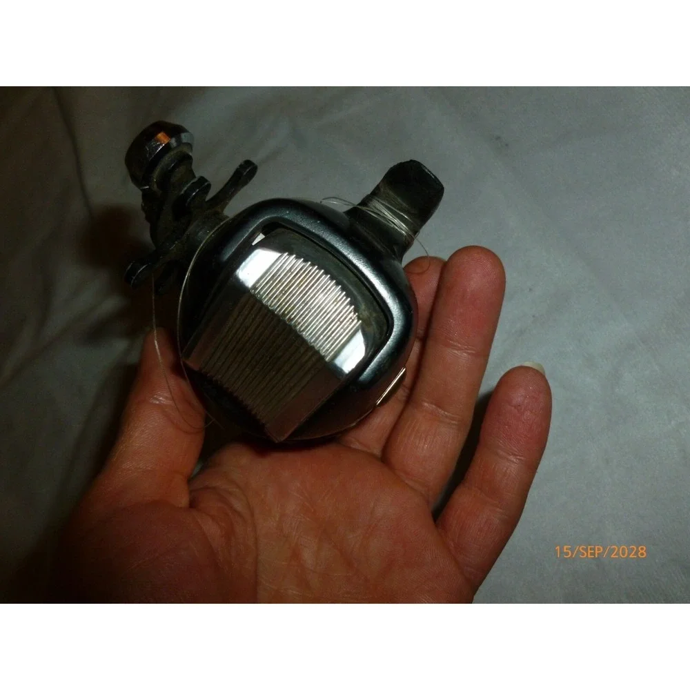 Vintage Sportfisher Spincast Fishing Reel Black Chrome Push Button Star Drag